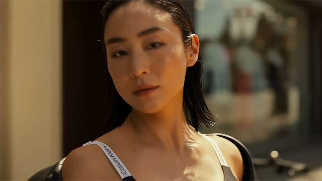 Greta Lee in Calvin Klein